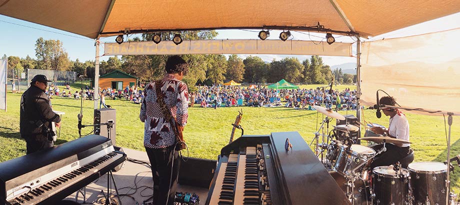 Backstage shot of a band playing at the Mt. Shasta Community Concert Series.